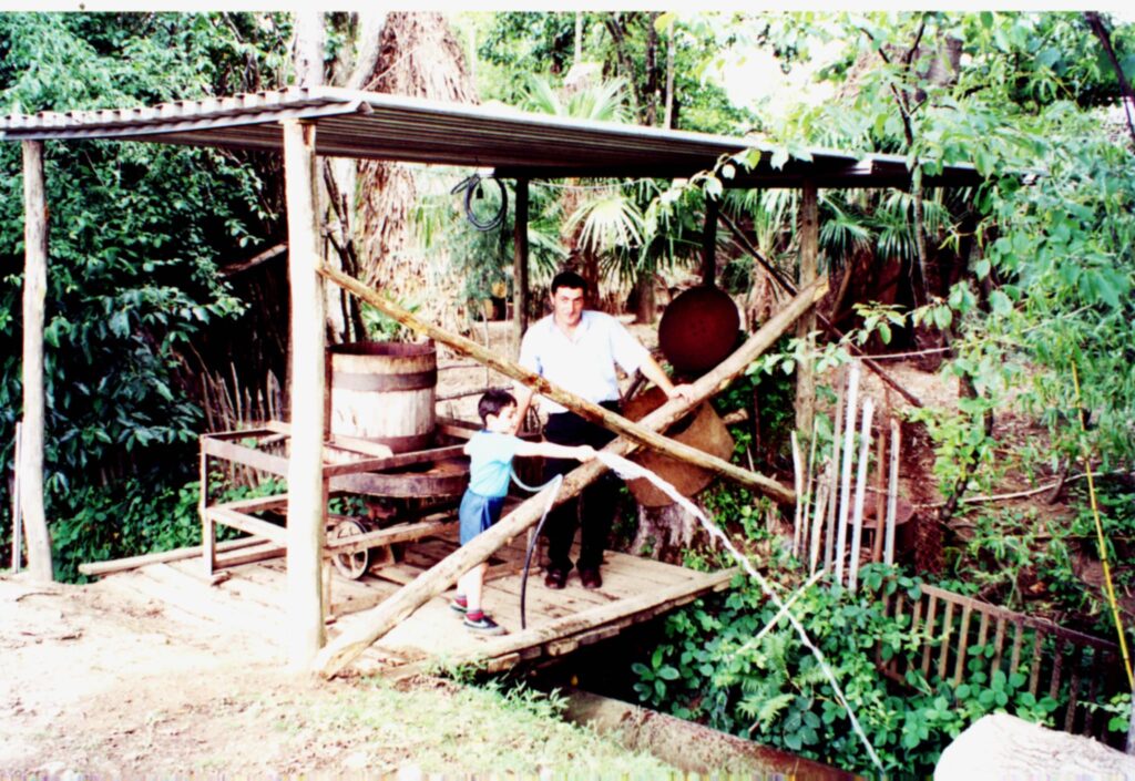 Dato and Gabriel with their first homemade tea roller