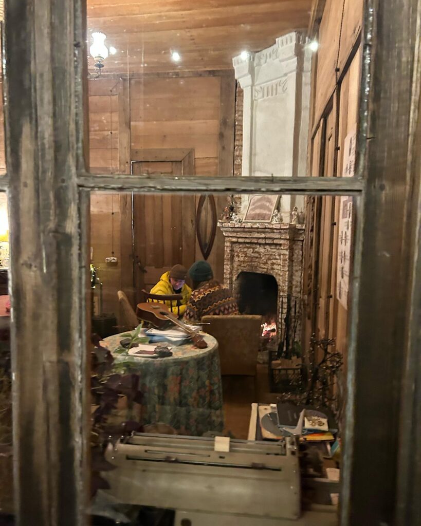 The historical oda house at Komli, with its original windows and fireplace